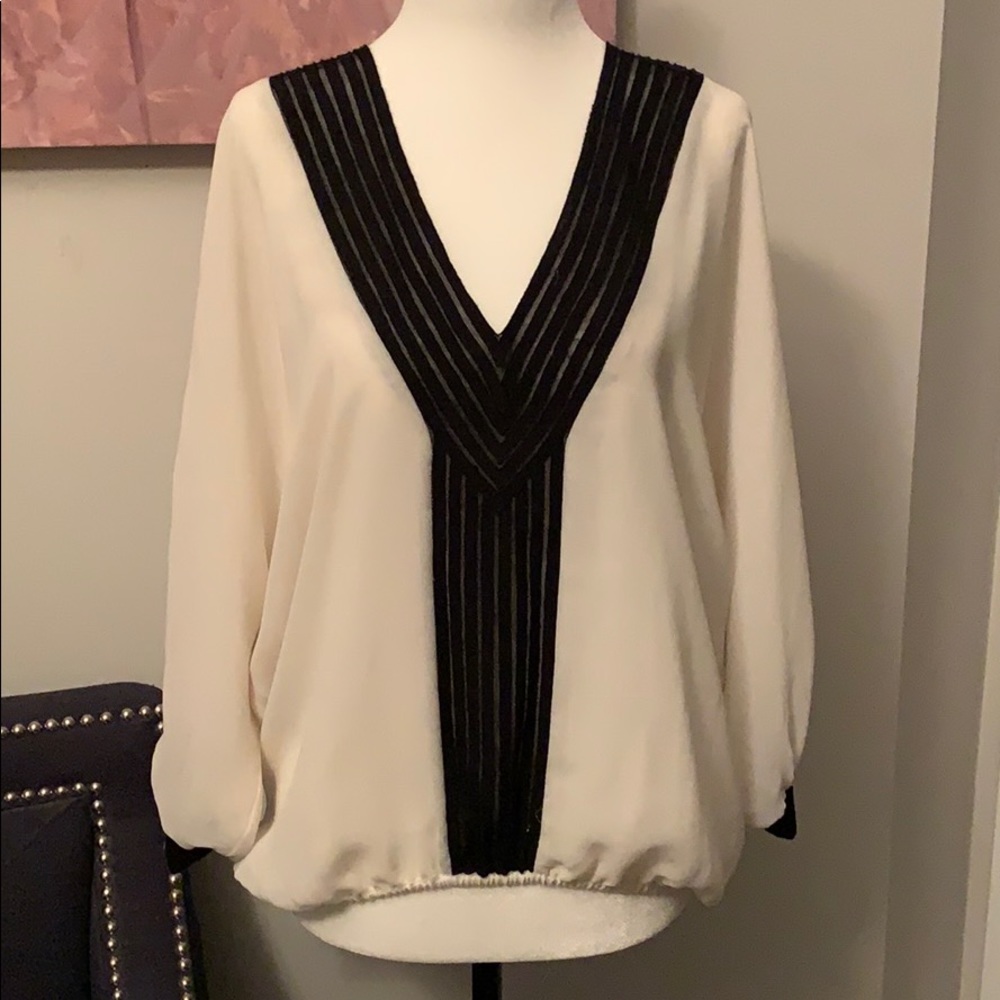 BEBE white and black blouse